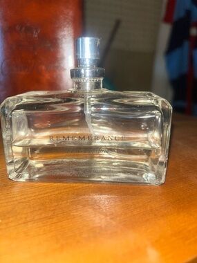 Ralph Lauren Remembrance Clear Glass Perfume Bottle with Light Amber Liquid